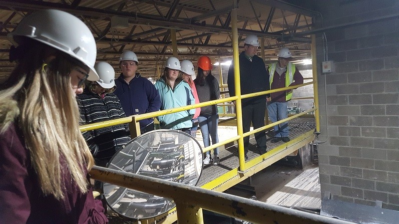 Gutchess Lumber showing hardwood manufacturing process to students